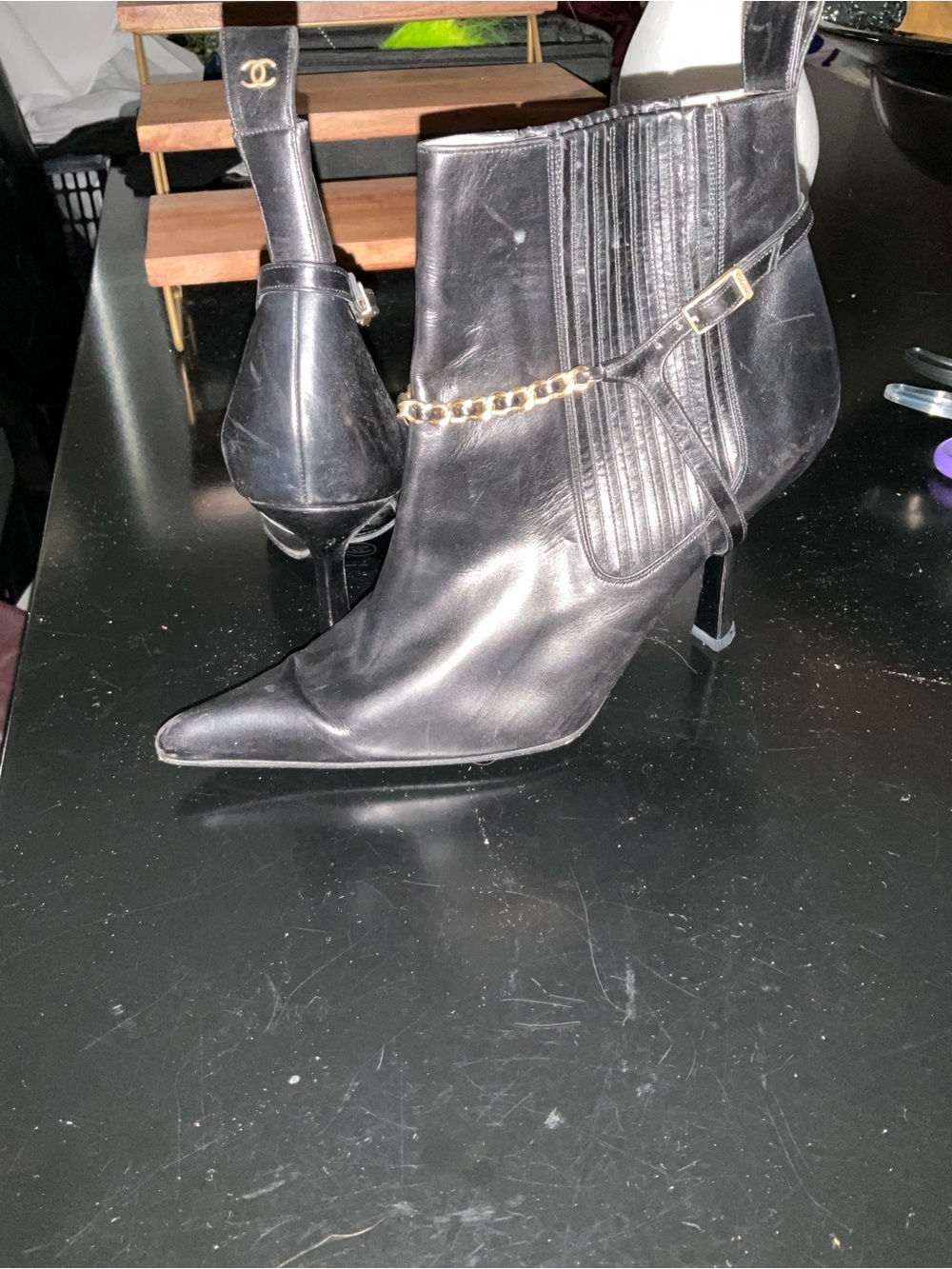 CHANEL Black Leather Pointed Toe Stiletto Ankle Boots with Chain Strap